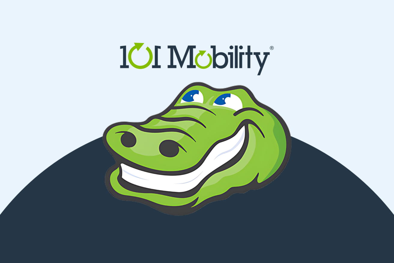 A cartoon alligator with a wide smile is centered beneath the 101 Mobility logo, which includes text and green arrows. The background is light blue with a dark blue arc at the bottom.