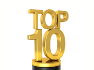 A gold "Top 10" trophy with shiny metallic text sits on a black base.