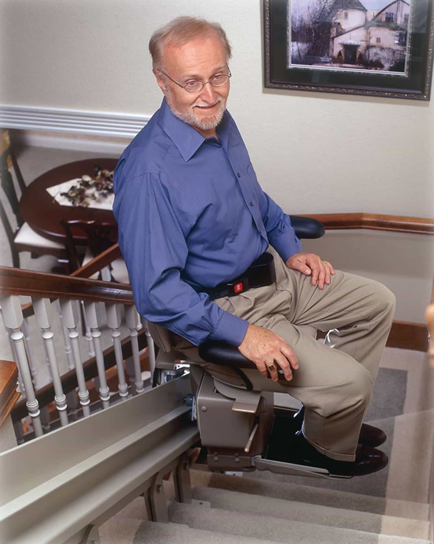 elderly man in stairlift