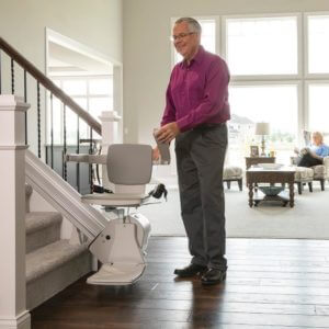 man beside stairlift