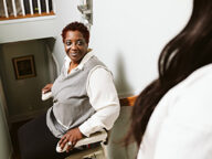 Woman on the stairlift