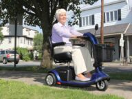 pride power scooter in blue.