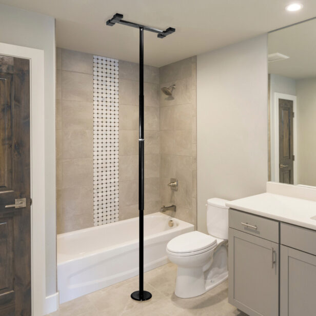 a stander pole installed in a bathroom.