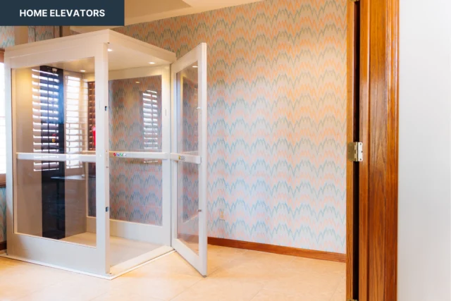 A home elevator with glass doors is shown in a room with patterned wallpaper and tiled flooring.